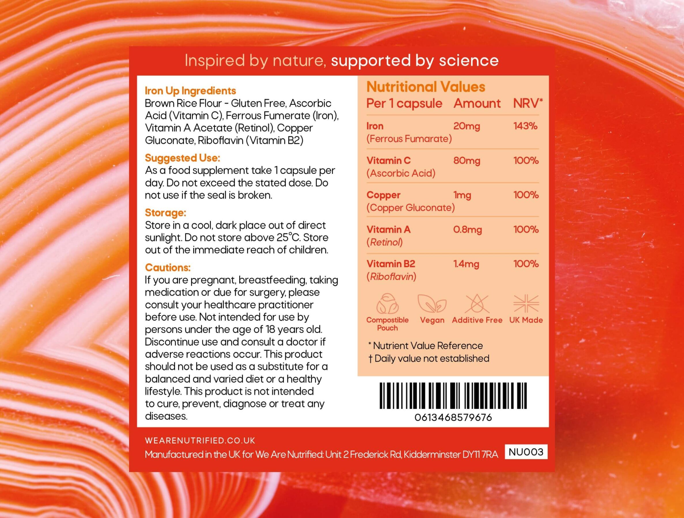 Iron Up iron supplement nutritional information label on orange background