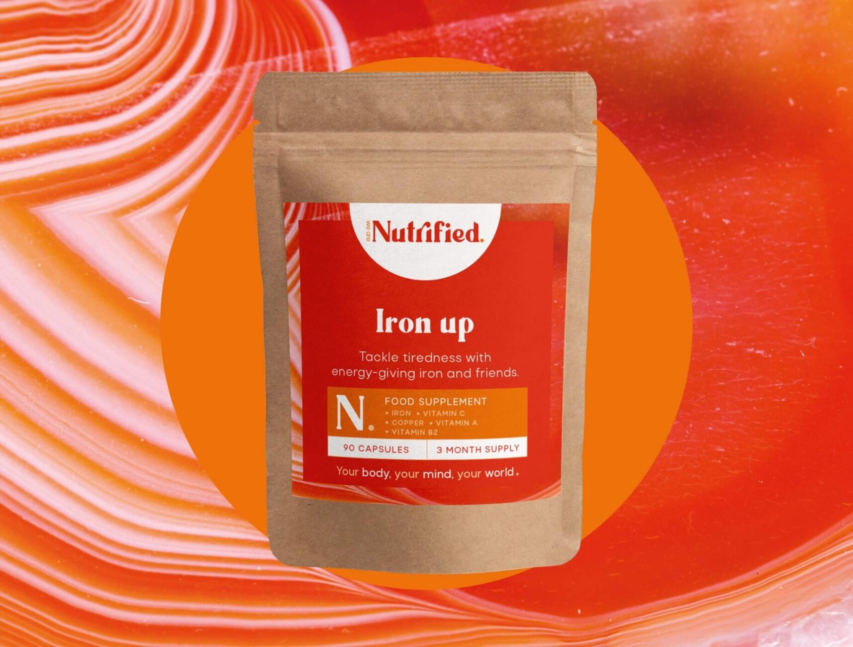 Iron up vegan iron supplement pouch front on orange background
